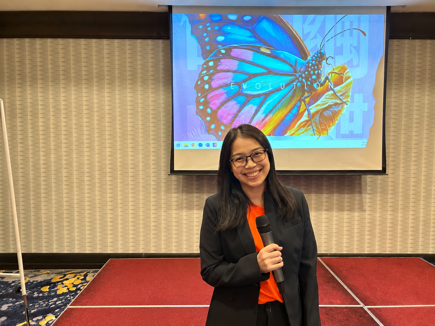 Smiling Presenter Before Butterfly Slide https://yeg.uat.amalaysia.com/wp-content/uploads/2026/10/Smiling-Presenter-Before-Butterfly-Slide.png